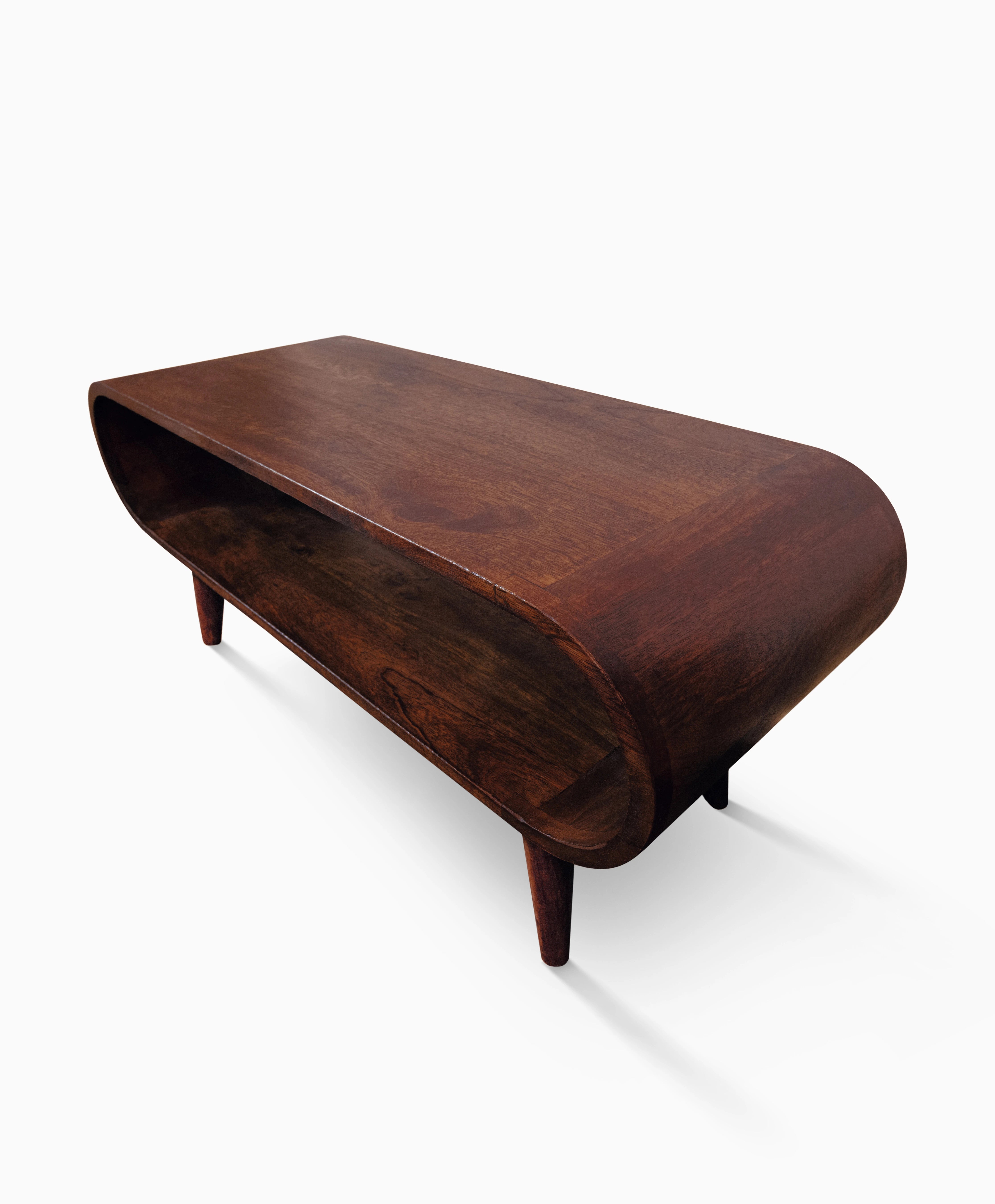 Oval Scandi coffee table with narrow shape and solid legs